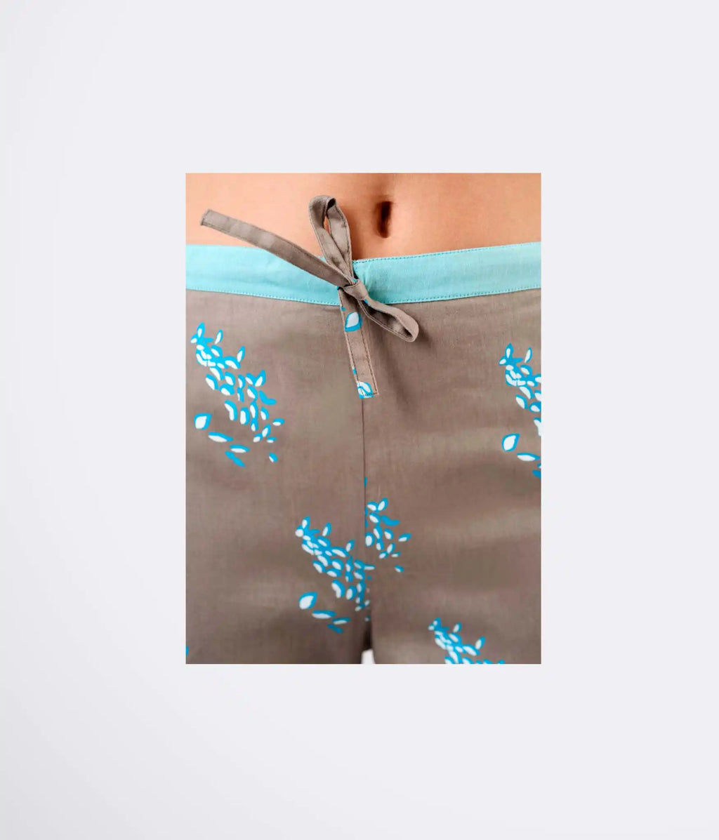 Coba Sewing pattern trousers with blue floral patterns 